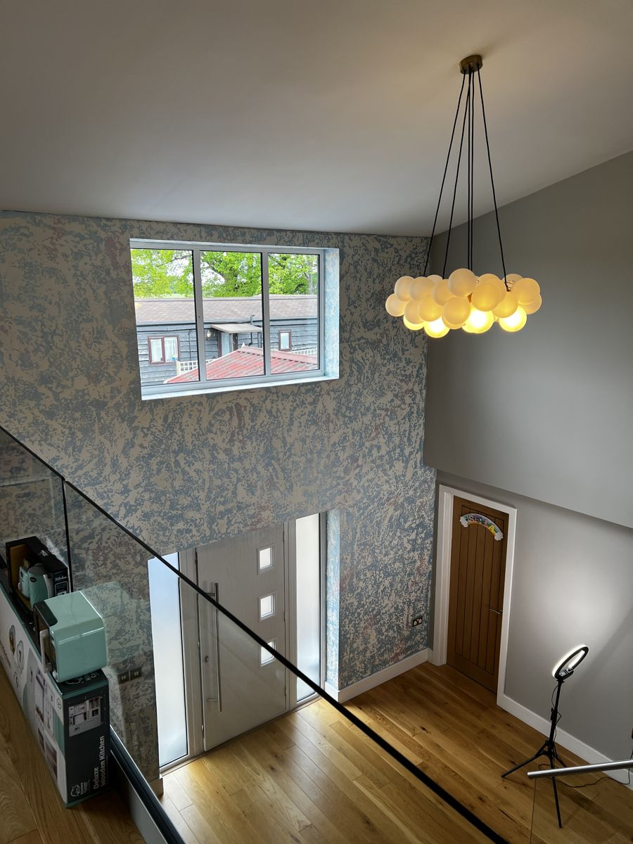Venetian plaster hallway wall seen from the landing